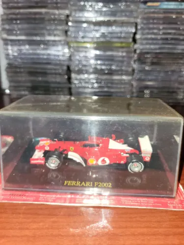 MINIATURA ESCALA 1:43 FERRARI COLLECTIONS 2002 SCHUMACHER NOVA LACRADA ( SÓ RETIRADA )