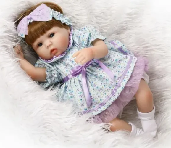 Boneca Bebê Reborn Menina Recém-nascida, com chupeta e mamadeira 