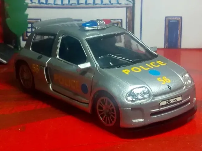 MINIATURA RENAULT CLIO SPORT V6 - SAICO 1/32 DP5402 - POLICE 56.