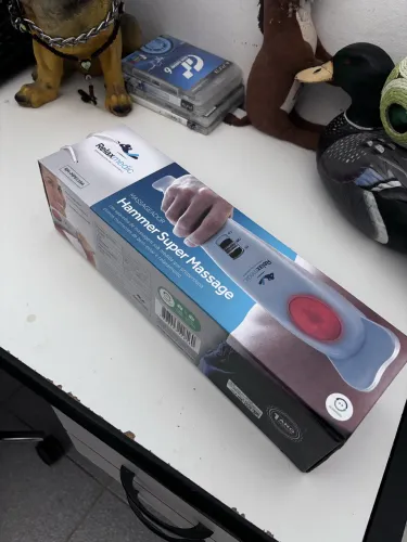 Massageador portátil de dupla ação.