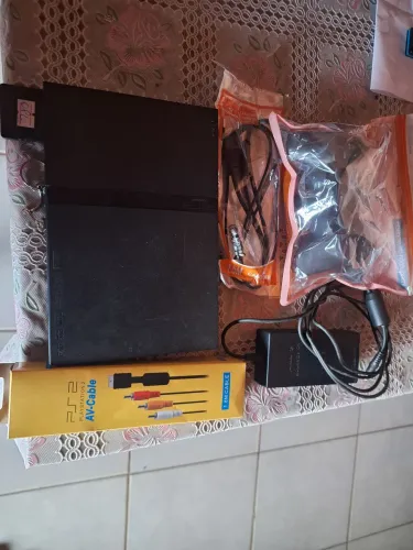 PS2 SLIM DESBLOQUEADO COM CONTROLE NOVO TODOS OS CABOS MAIS JOGOS GARANTIA..