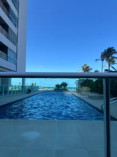 Alugo apto pé na areia, com 04 suítes 