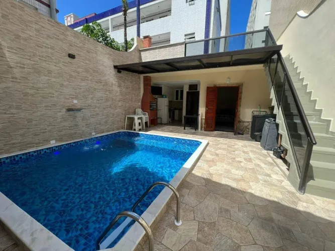 Casa com 3 dormitórios e piscina à venda, 125 m² por R$ 1.060.000 - Caiçara - Praia Grande