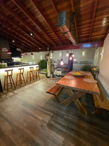 Casa com 3 dormitórios à venda, 120 m² por R$ 700.000,00 - Condomínio Villa Flora - Votora