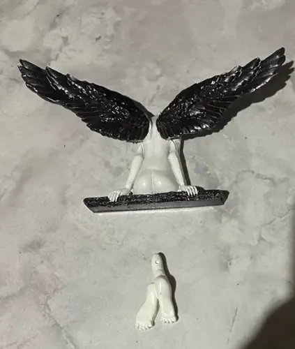 Escultura de parede anjo sentado - resina