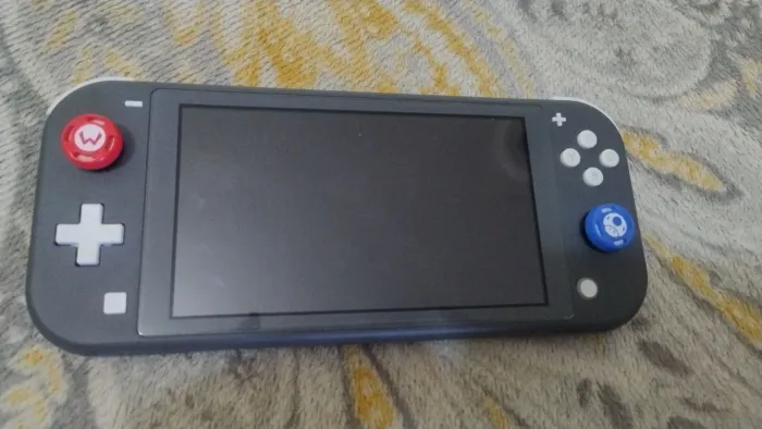Nintendo Switch Lite + Zelda BOTW