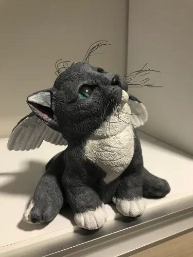 Estátua anjo gatinho