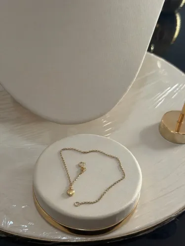Pulseira feminina em ouro 18k coração único