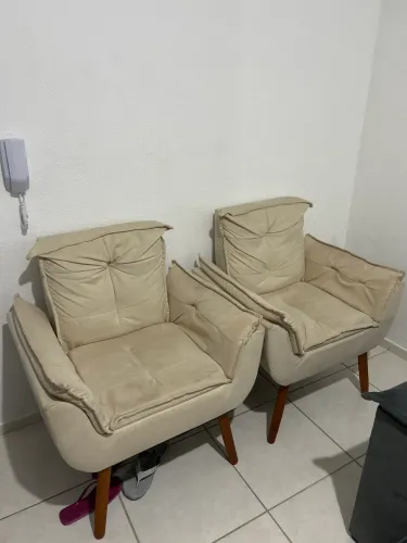 Poltronas conforto beje salão de beleza recepção