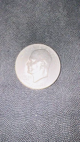 Moeda de 1 dólar. Ano 1976.  Liga de prata. 4 cm   