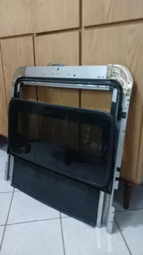Teto solar GM Tracker 2004