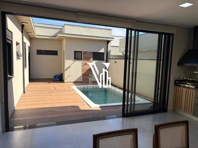Casa à venda em condomínio fechado em Hortolândia 3 suítes, piscina e acabamento de alto p