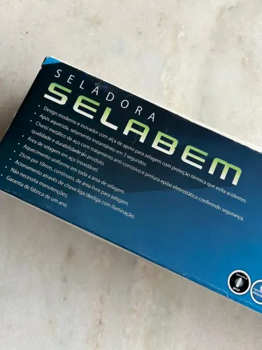 Seladora nova, na caixa 