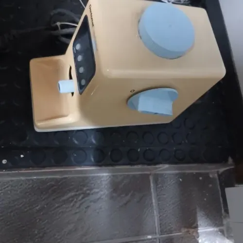 Dentomat e camera de revelação 