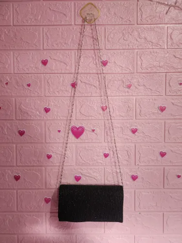 Bolsa preta de festa brilhosa