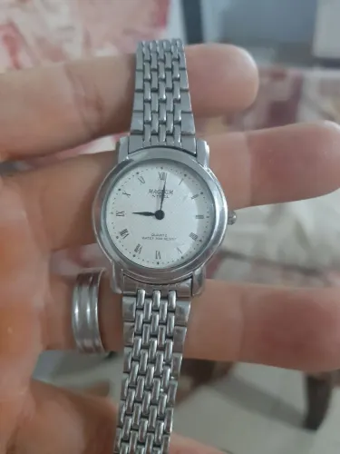 Vendo um relógio maguinun funcionando perfeitamente 