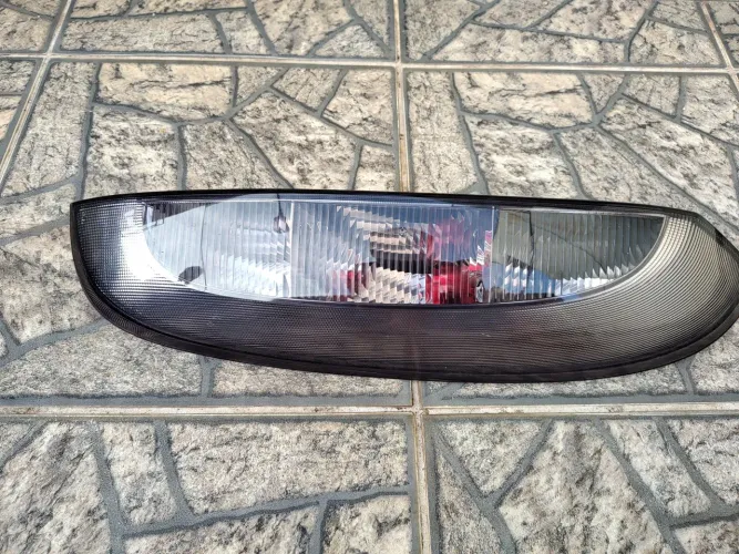 Lanterna Corsa Hatch Premium frente Montana corsão fumê