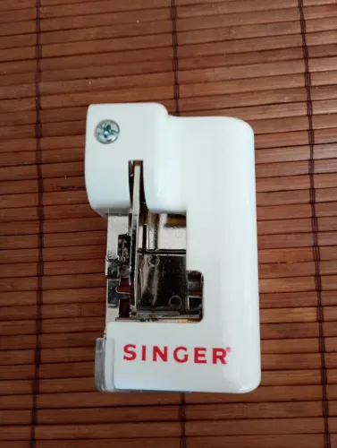 calcador (ou sapatilha) de corte lateral tipo overlock
