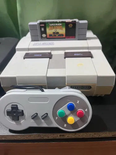 Super Nintendo completo com cartucho Super Mario World e Mario All Star