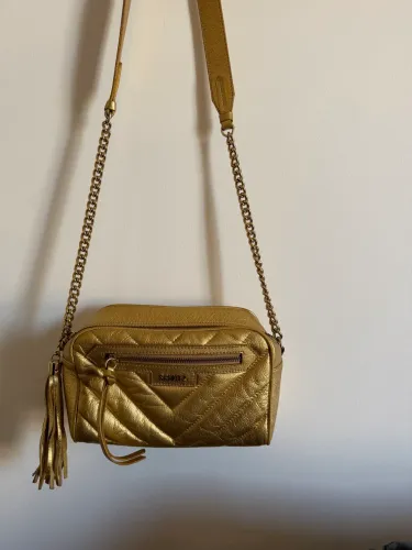 Vendo bolsa Schutz dourada nova