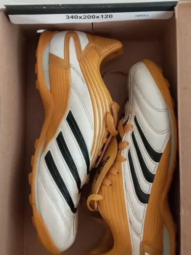 Chuteira Adidas predito
