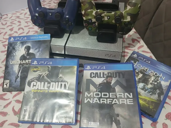 PS4 500gb com jogos e suporte para console e manetes