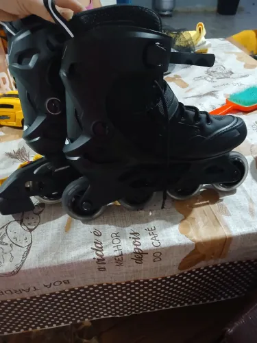 Patins Oxelo + kit de Proteção.
