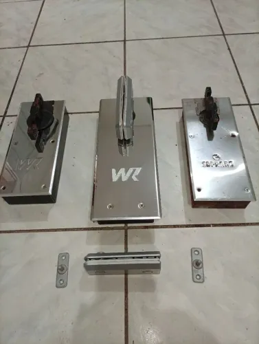 Mola de porta de vidro