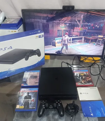 Ps4 slim com 3 jogos , controle , Caixa e todos acessórios.