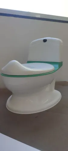 Troninho sonoro marca Minimi infantil verde - Em Ótimo Estado