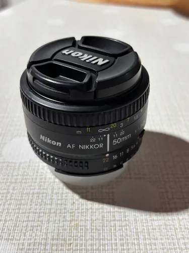 ? Nikon 50mm f/1.8D - R$ 550 | Vendo rápido