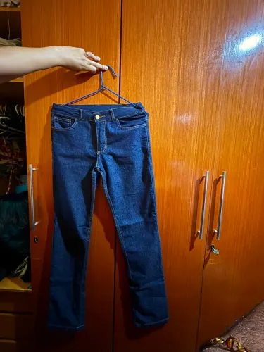 Calça jeans tamanho (36/38)