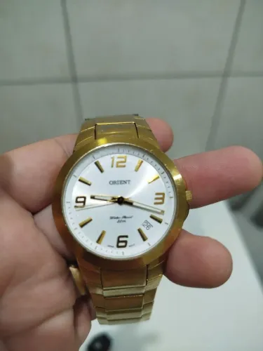 Relógio orient masculino dourado 