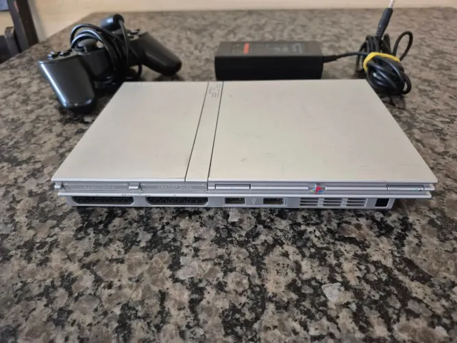 Playstation 2 raro cinza