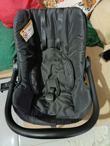 Cadeira infantil para auto Cosco.