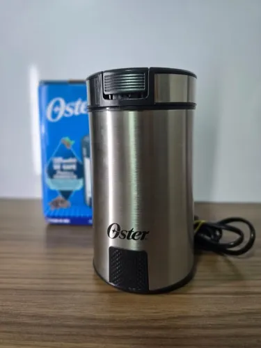 Moedor de Café Oster Inox Preto e Prata - 110v
