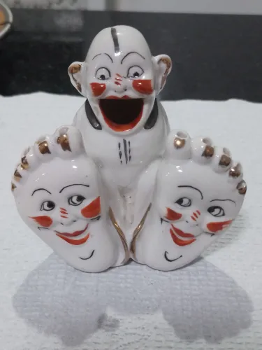 Antigo porta palitos de porcelana estilo palhaço 