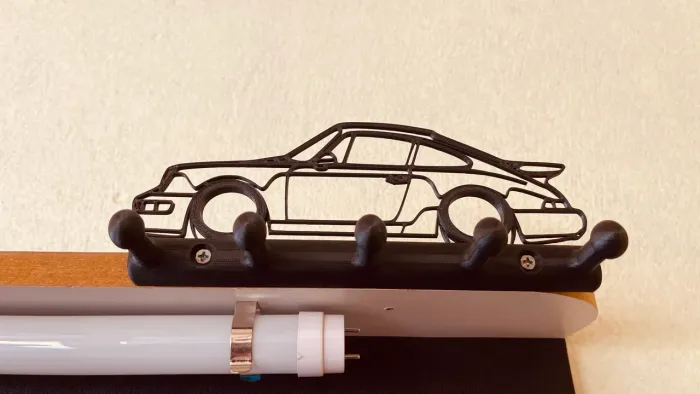 Porta chaves na silhueta de uma Porsche