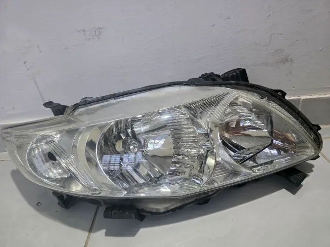 Farol original corolla 2009/2011