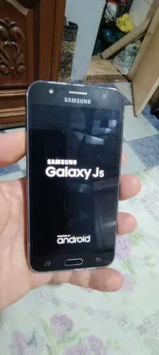 Celular j5 funcionando normalmente capa traseira quebrada 