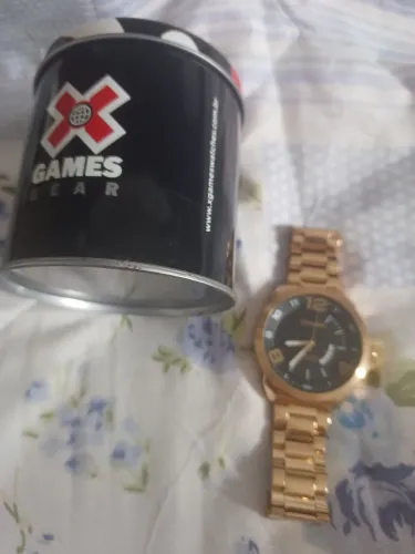 Relógio X game dourado 