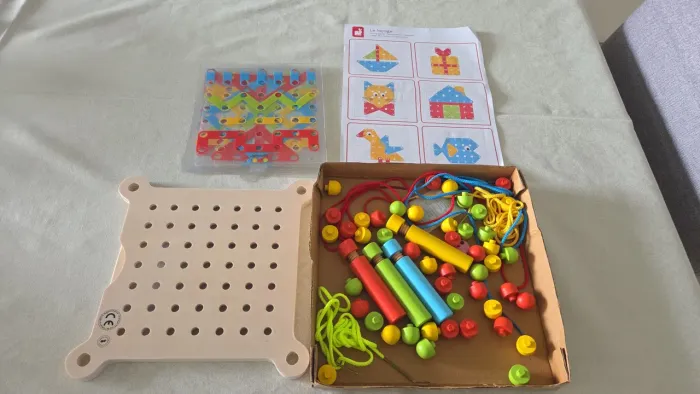  Brinquedo educativo Le laçage (O Cardaço).