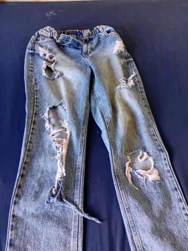 calça rasgada jaens