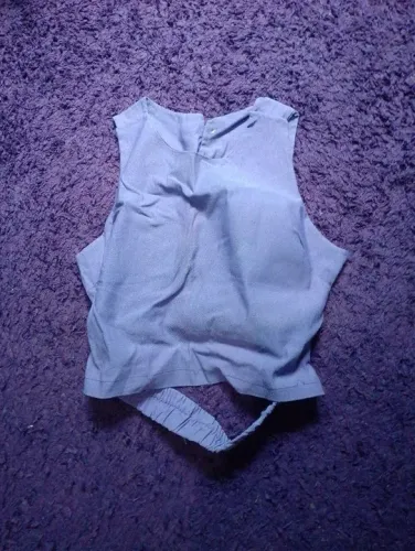 Blusa feminina roxa com detalhe em nó