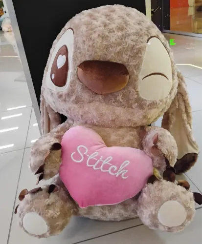 Pelúcia Titi chocolate