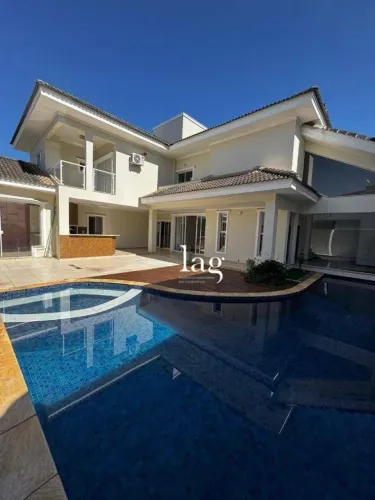 Casa com 4 dormitórios à venda, 443 m² por R$ 2.995.000,00 - Condomínio Villa dos Inglezes