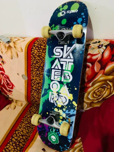Skate semi novo Spin top! Pra iniciante