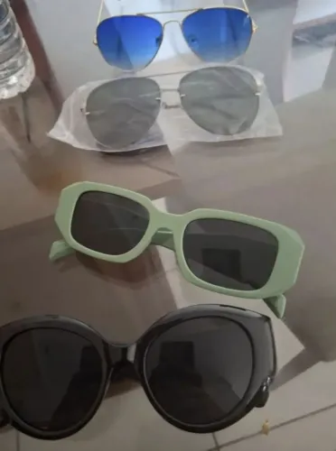 PROMOÇÃO! par de óculos escuros.com uv unissex , valor por par! 