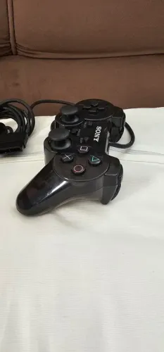 CONTROLE PS2 TRANSLÚCIDO IMPECÁVEL SEM TESTE FOTOS FAZ PARTE DO ANÚNCIO. NAO SEi ORIGINAL