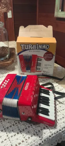 Mini acordeonista turbinho